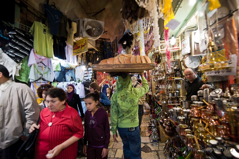 20100408_123632 D3.jpg - Carrying loaves of pita on head, Islamic Quarter